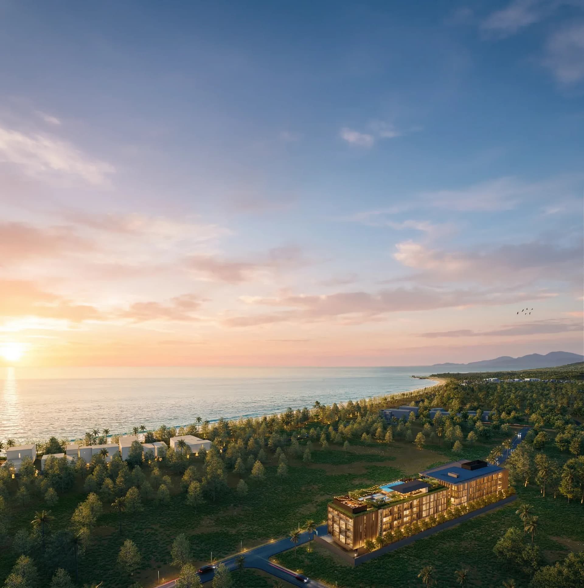 The site from above: the two buildings, Nai Yang beach and the Andaman Sea behind